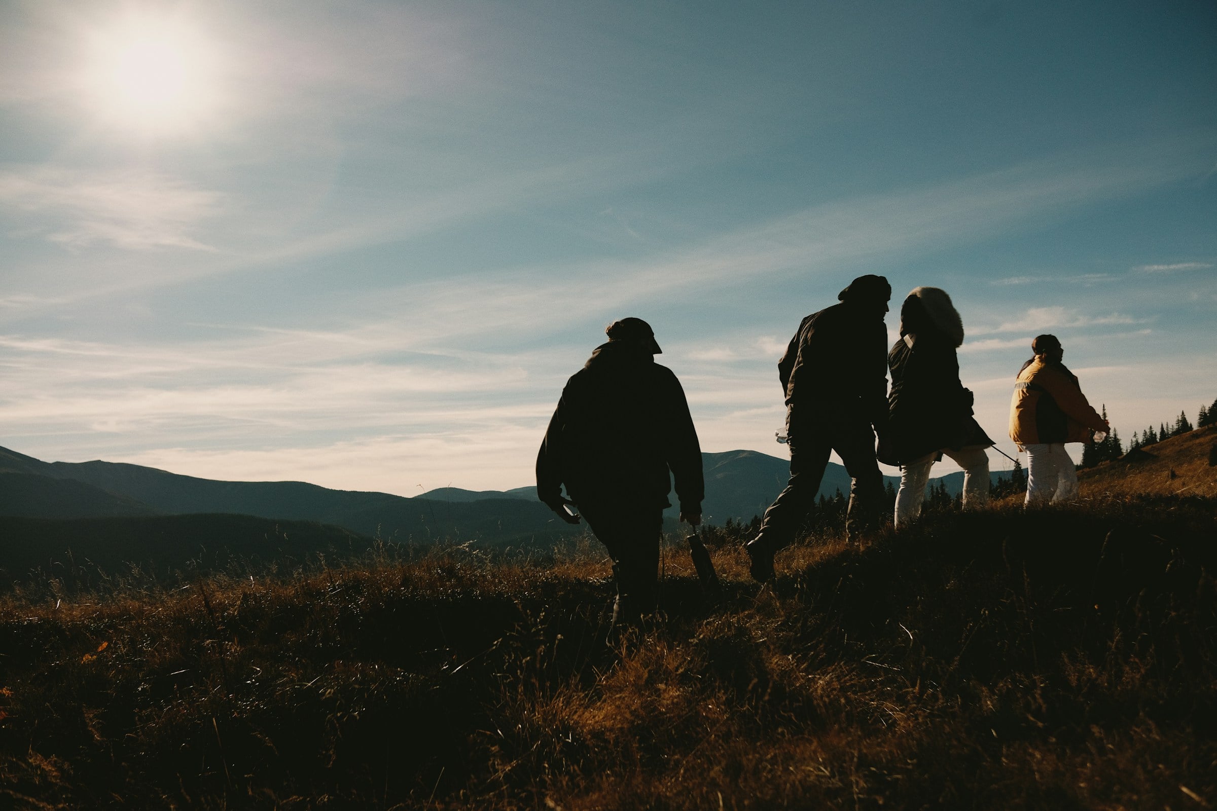 Group hiking together on a mountain trail
